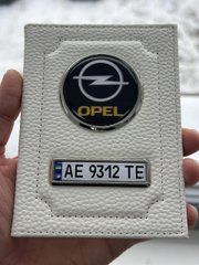 Шкіряна обкладинка для автодокументів із логотипом OPEL і годен. номером авто ребриста біла шкіра